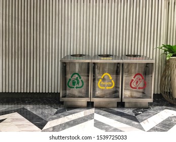 The group of bin at the mall for people can separate the type of garbage for environment.