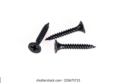 Group Of Black Screw Head On White Background