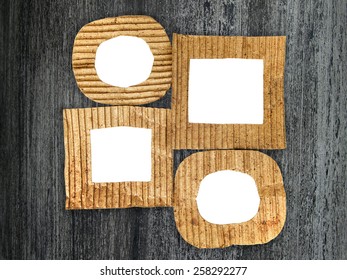 Group of blank cardboard frames on grunge painted background