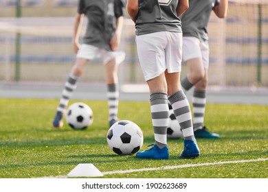 Group of Boys on Soccer Training. Players Practicing European Football on a Summer Day. Children Playing Sports on School Grass Stadium