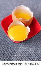 Group Of Broken Brown Raw Eggs,