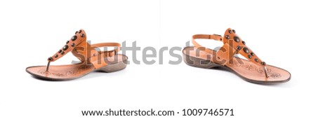 Group of brown leather sandals on white background, isolated product, comfortable footwear.