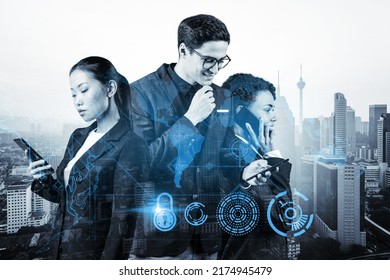 Group Of Business Colleagues As A Part Of Multinational Corporate Team Working On Project To Protect Clients Information At Cybersecurity Compliance Division. IT Lock Icons Over Kuala Lumpur