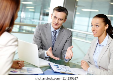 Group Business Partners Interacting Meeting Office Stock Photo ...