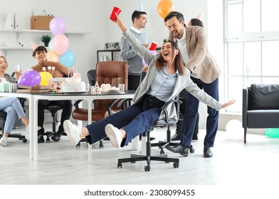 Group of business people at birthday party in office - Powered by Shutterstock