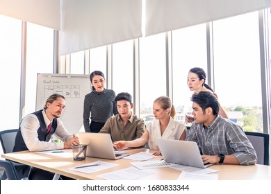 Group Of Business People Brainstorm To Solve Problem And Presentation In Teamwork. Woman Discuss With Manger And Colleague Team In Meeting Room. Business Finance And Communication Planning Concept.