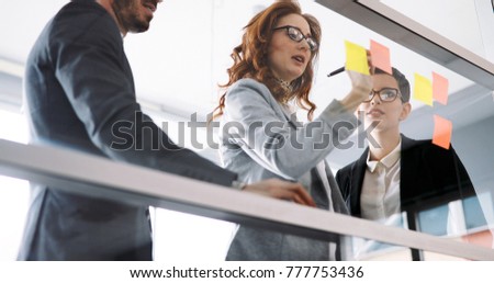 Group of business people collaborating in office