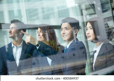 Group Of Business People Discuss About The Project Inside Office