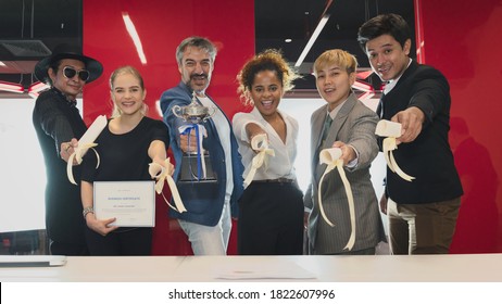 Group Of Business People With Diverse Genders (LGBT) Celebrate Business Successful Achievement Award Ceremony In The Meeting Room At Office Workplace