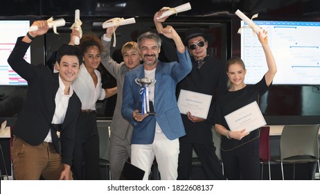 Group Of Business People With Diverse Genders (LGBT) Celebrate Business Successful Achievement Award Ceremony In The Meeting Room At Office Workplace