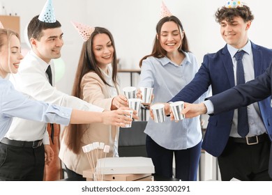 Group of business people drinking at birthday party in office - Powered by Shutterstock