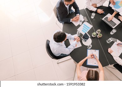 Group Of Business People During Meeting In Office, Top View