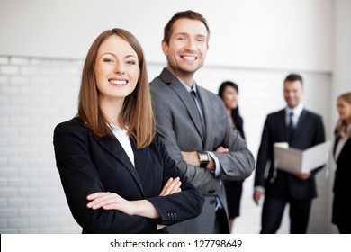 Group Of Business People  With Female Leader In Foreground