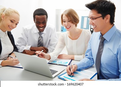 Group of business people having meeting together