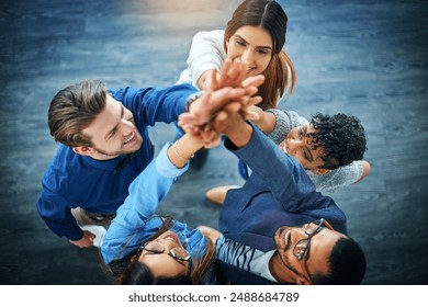 Group, business people and high five in huddle for collaboration, support or diversity in workplace. Staff, above and teamwork at company office with hands up, together for goal with solidarity - Powered by Shutterstock