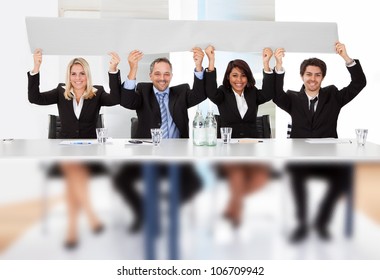 Group Of Business People Holding Empty Placard