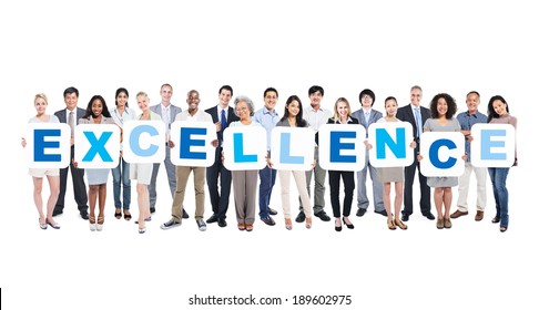 Group Of Business People Holding The Word Excellence