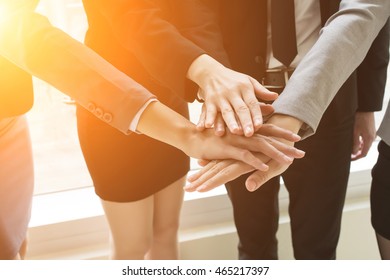 Group Of Business People Joining Hand Together For Making A Deal