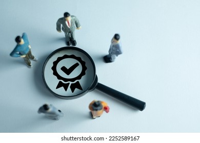 Group of Business people looking magnifying glass with check mark guarantee icon use for ISO certification,Quality Control certification,Quality assurance, Guarantee Concept. - Powered by Shutterstock