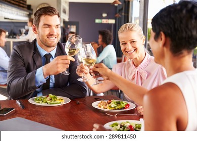 Group of business people at lunch in a restaurant