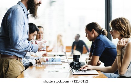 Group of business people in a meeting - Shutterstock ID 712148152