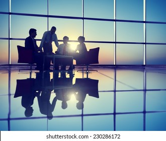 Group of Business People Meeting in Back Lit