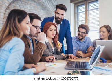 Group business people meeting to discuss ideas in modern office - Shutterstock ID 1058780777