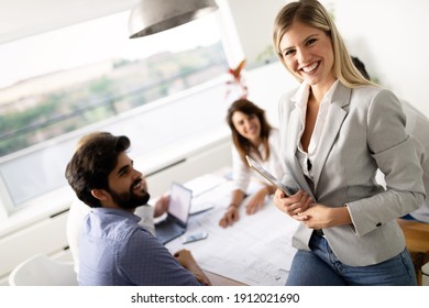 Group of business people meeting in office, sharing their ideas. - Shutterstock ID 1912021690