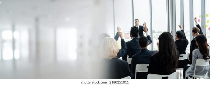 Group Of Business People Meeting In A Seminar Conference Widen View . Audience Listening To Instructor In Employee Education Training Session . Office Worker Community Summit Forum With Speaker .