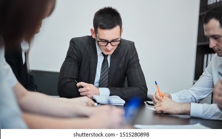 Group of business people in a modern office, working businessmen engaged in planning generating ideas and concepts. - Shutterstock ID 1515280898