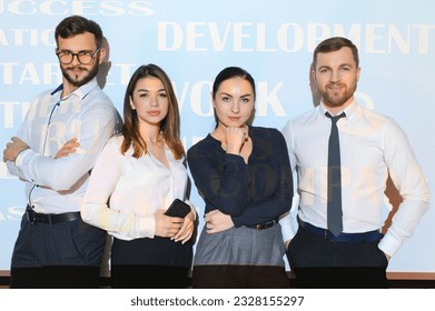 group of business people on the background of motivational words. - Powered by Shutterstock