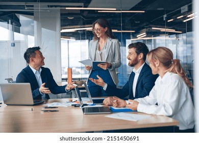 A group of business people partners during a set team meeting in the modern office.High quality  - Powered by Shutterstock