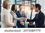 Group, business people and shaking hands for welcome, introduction or meeting in office. Handshake, smile and team with deal for collaboration, agreement or thank you for b2b partnership opportunity