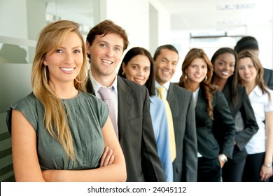 Group Of Business People Smiling In An Office Lined Up