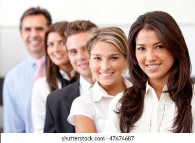 Group Of Business People Smiling In An Office