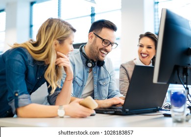 Group Of Business People And Software Developers Working As A Team In Office