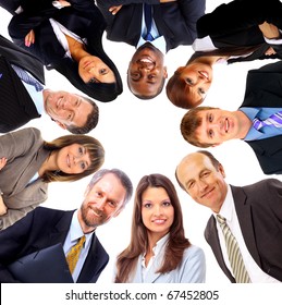 Group Of Business People Standing In Huddle, Smiling, Low Angle View