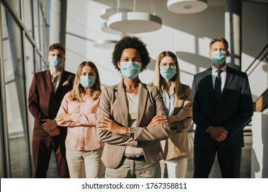 Group Of Business People Standing In The Office And Wear Mask For Protect Prevent Infection By Corona Virus