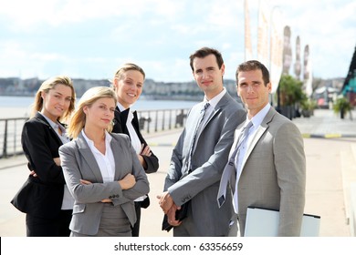 Group Of Business People Standing Outside A Trade Fair