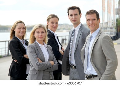 Group Of Business People Standing Outside A Trade Fair