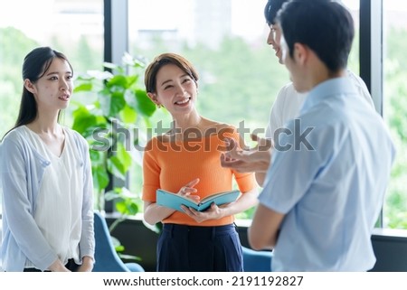 group of business people talking in the office