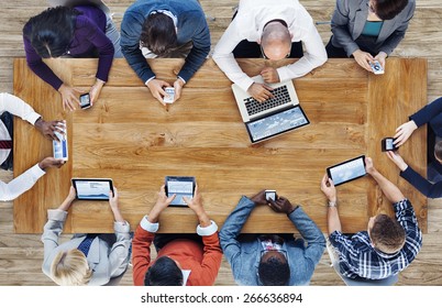 Group Of Business People Using Digital Devices