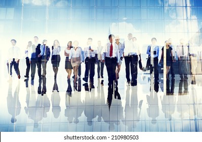 Group Of Business People Walking Forward