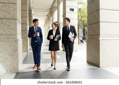 Group Of Business People Walking On The Street