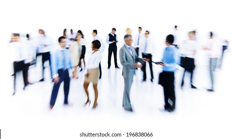 Group Of Business People Working Blurred Motion Indoors 