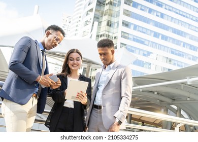 Group Of Business People.Business People Meeting Talking And Sharing Their Ideas In City. Business Team And Teamwork Concept. Business People Standing Outside In The City Discussing About New Project.