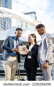 Group Of Business People.Business People Meeting Talking And Sharing Their Ideas In City. Business Team And Teamwork Concept. Business People Standing Outside In The City Discussing About New Project.