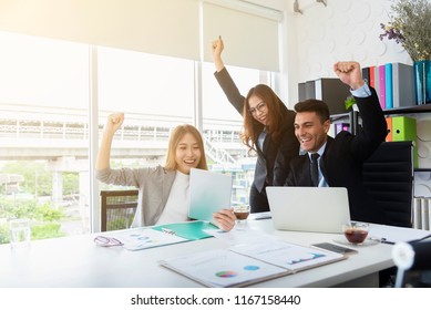 Group Of Business Peoples Raised Hand Up With Happiness In Meeting Room Office. Success Business And Partnership Concept.