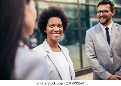 Group Of Business Team Meeting Outside