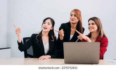 Group Business using a labtop while working together in office on meeting. Businesspeople collaborating on a new project. 